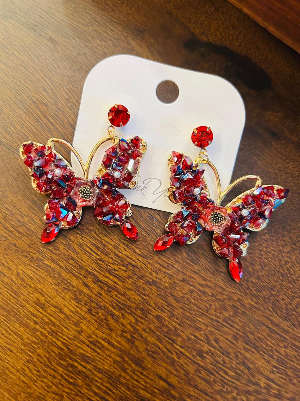 butterfly-shaped drop earrings